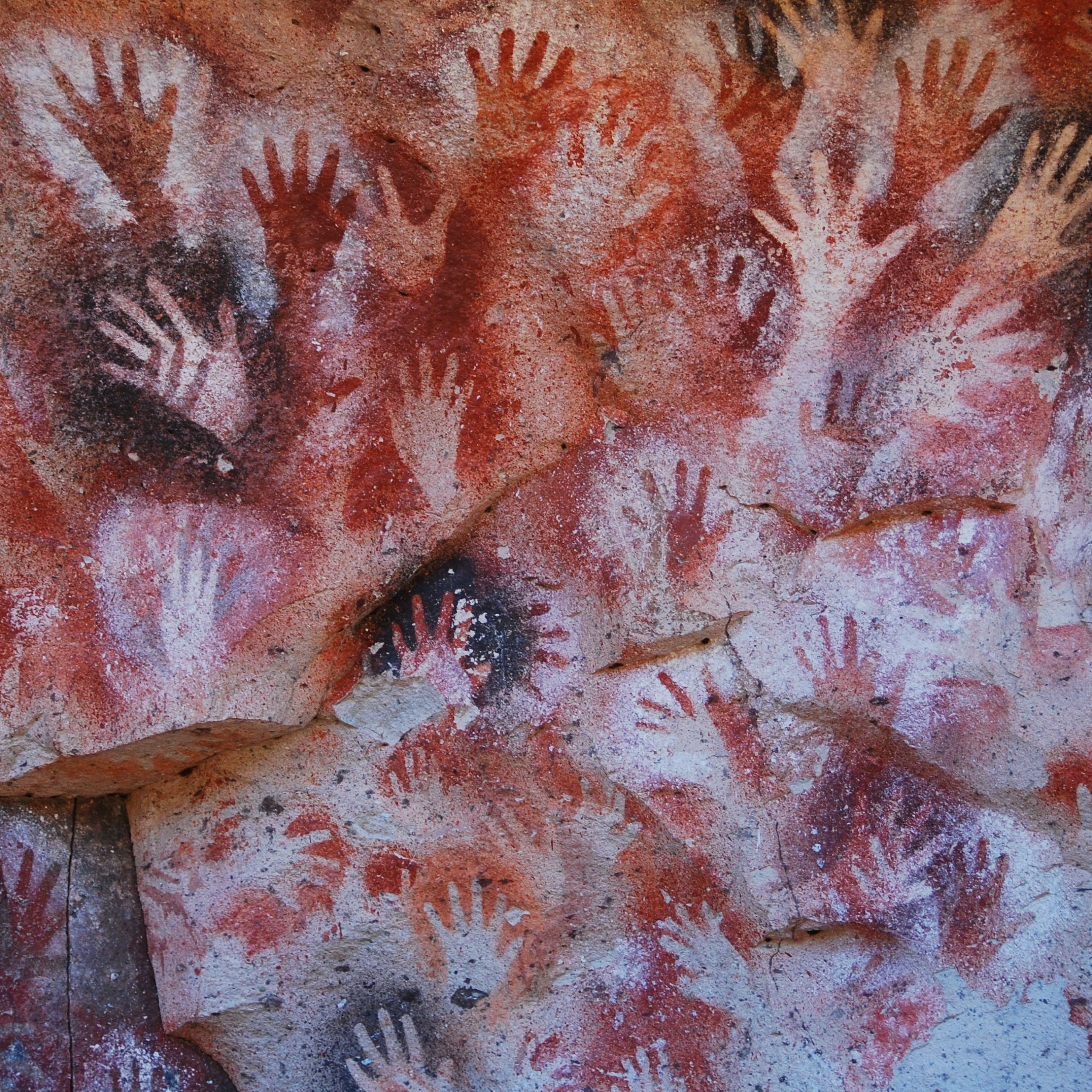 full frame shot of handprints on rock at cueva de las manos 5b6620fdc9e77c e8974