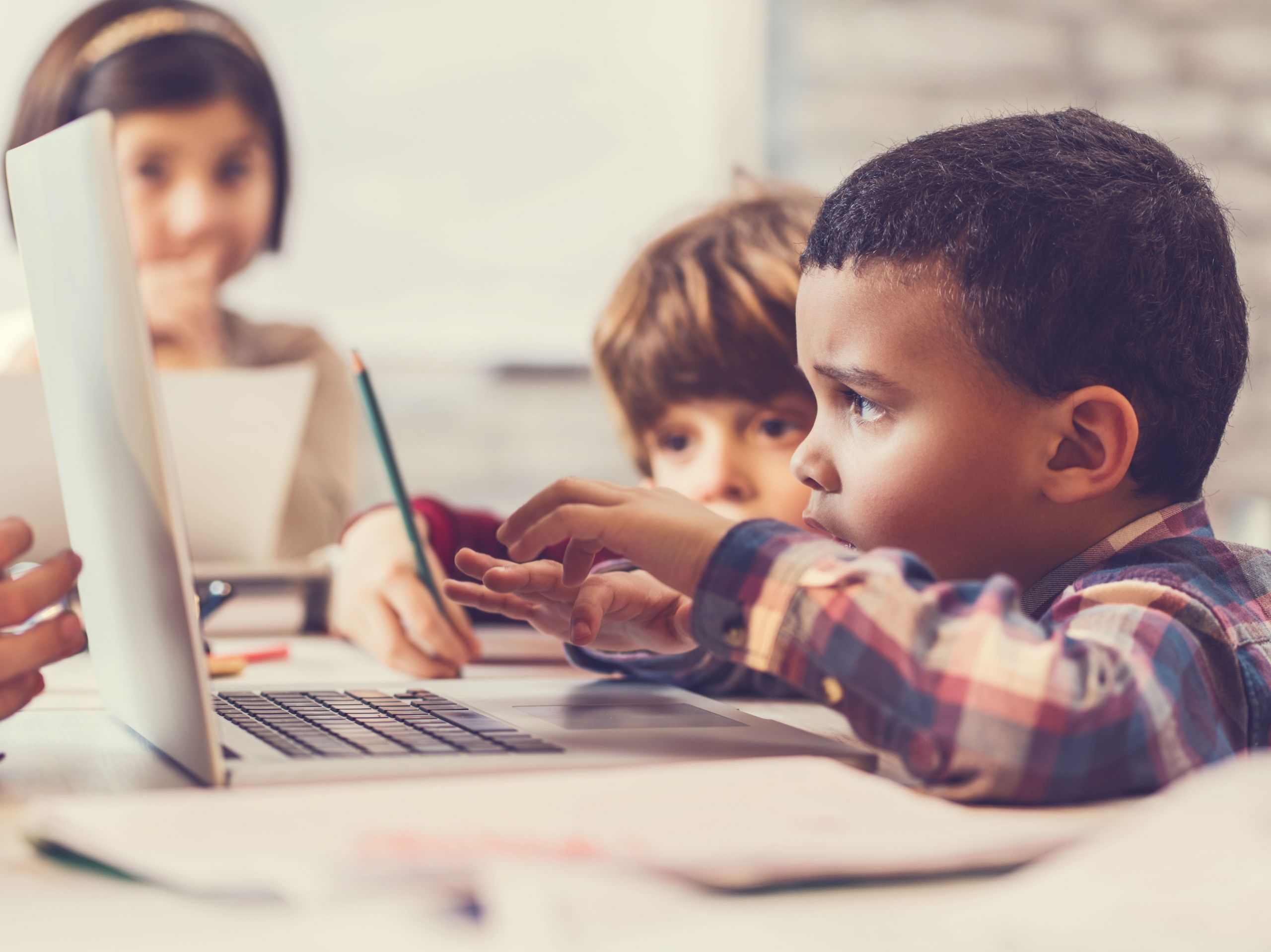 african american boy using laptop 5bef09c046e0fb0026cbe359